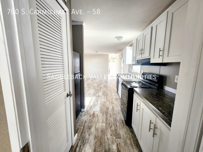 Building Photo - 700 S Carmichael Ave