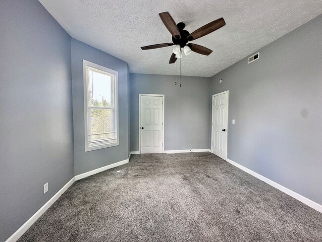 Building Photo - Step into charm, comfort, and convenience in the heart of Historic Farrington’s Grove!