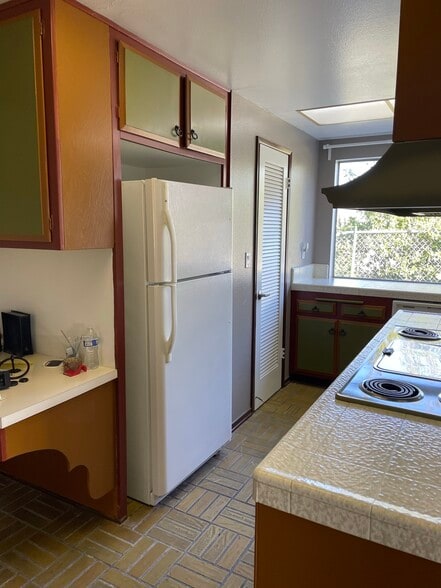 Kitchen Fridge and Pantry Wall - 6052 Pat Ave