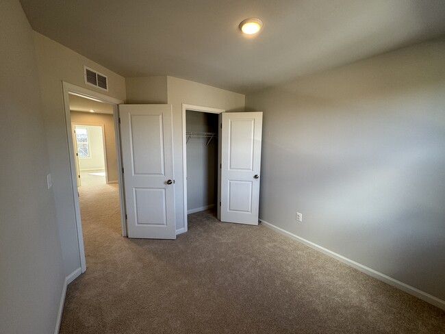 Upstairs bedroom 3 closet - 5977 Cling Ln