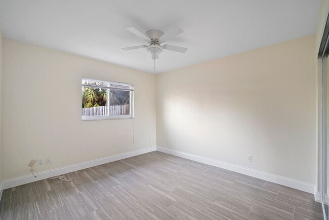 Building Photo - ANNUAL RENTAL - 2 Bedroom, 1 Bath w/ Garag...
