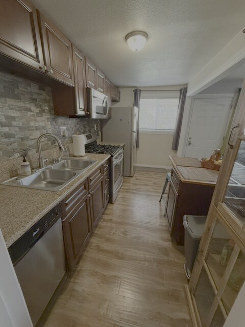 Building Photo - Fully Furnished Long Beach Retreat with Private Spa & Outdoor Entertaining Area