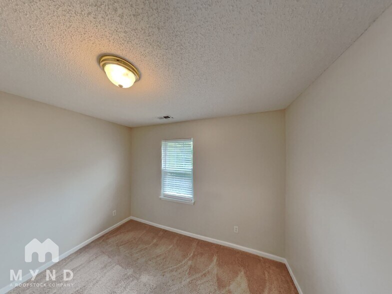 Building Photo - 6027 Briggs Dr