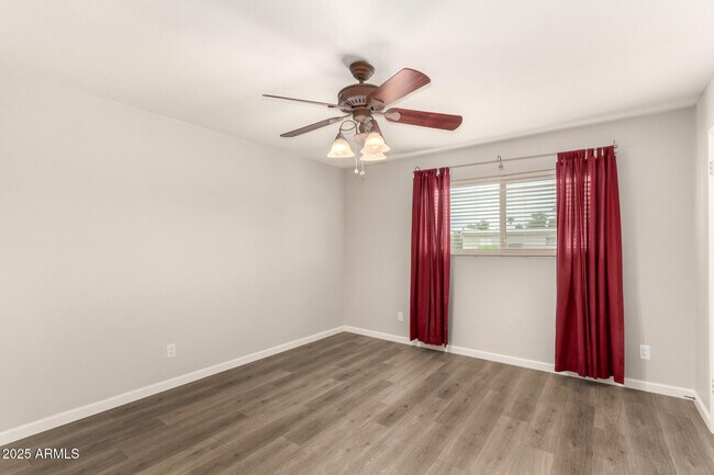 Building Photo - 8212 E Rovey Ave