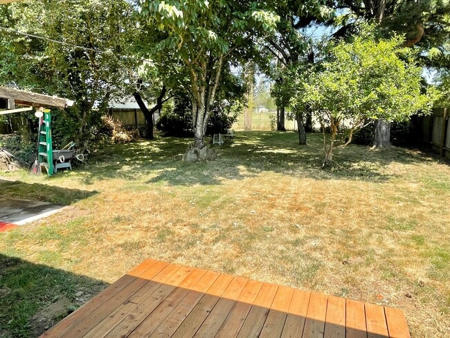 Building Photo - Centennial Remodeled Ranch Home with Large, Fenced Backyard, Attached Garage, Laminate Hardwoods