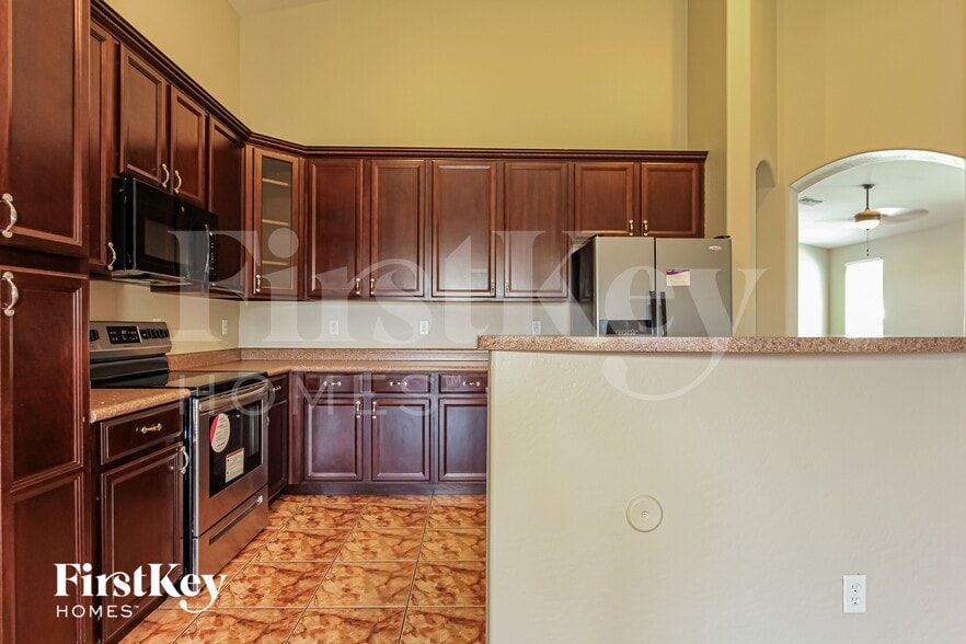 Building Photo - 14135 W Riviera Dr