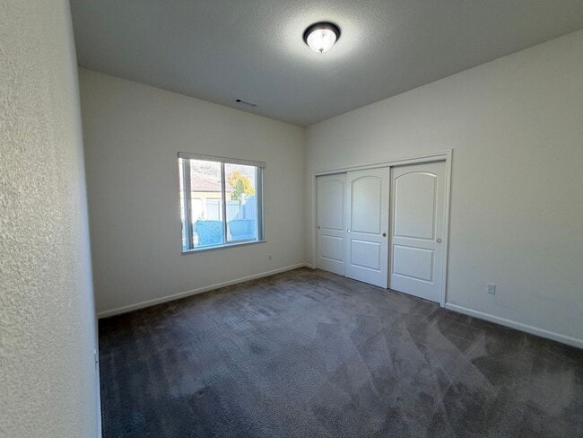 Building Photo - Spanish Springs 5bed/3bath - Move in Speci...
