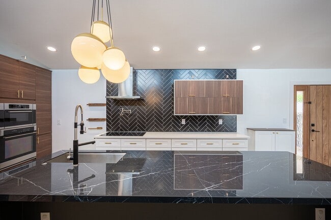 Building Photo - European-inspired Mid-Century Henderson Home!