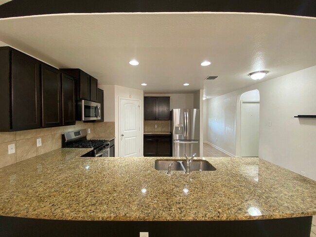 Building Photo - Spacious 4-Bedroom Home with Washer & Dryer Included in Riposa Vita Community!