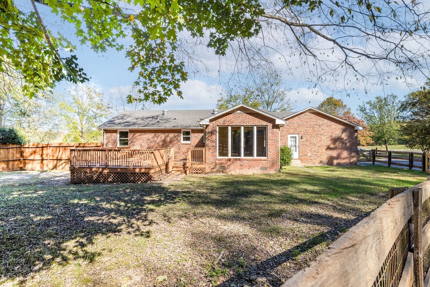 Wonderful views of the back yard from those picture windows. - 8171 Horton Hwy