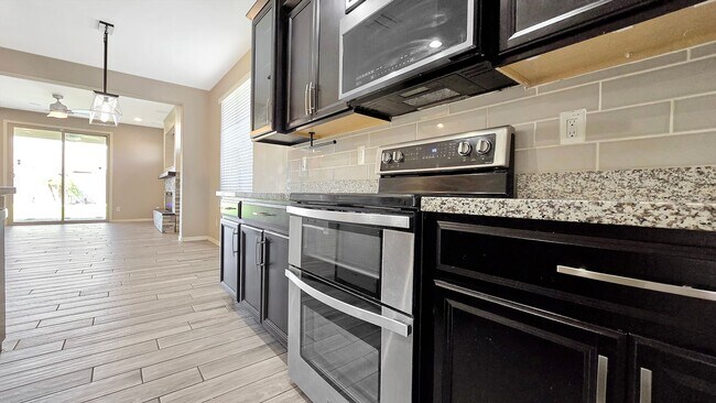 Building Photo - Amazing home for the money! Gorgeous backyard!