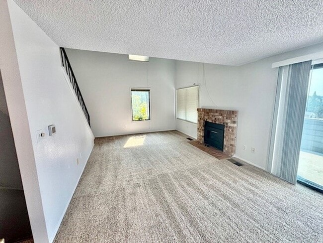 Building Photo - DES MOINES CONDO WITH PEEK-A-BOO SOUND VIEWS & PRIVATE GARAGE!