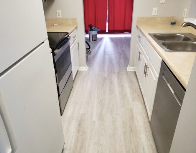 Building Photo - Move-In Ready 2 bedroom with attached Gara...