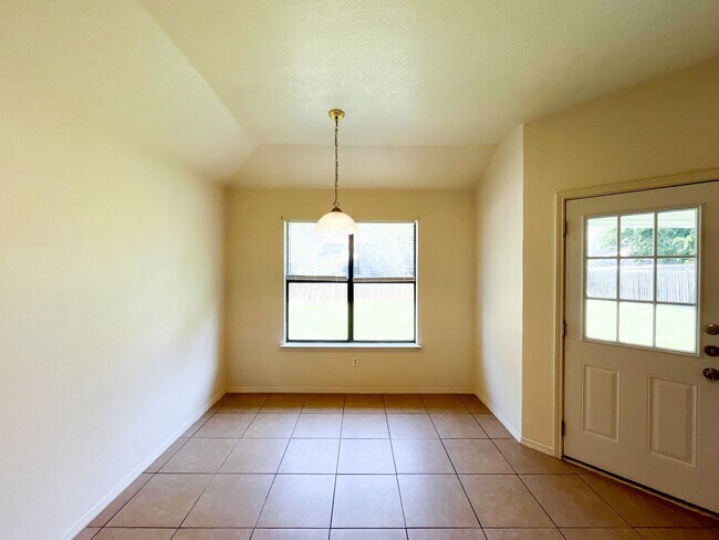 Building Photo - Available NOW!!!! Open floor plan features living room with fireplace, dining area, and large kit...