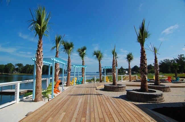 Building Photo - Partially Furnished Lakefront Retreat in Sunset Bay – Stunning Views & Resort-Style Amenities