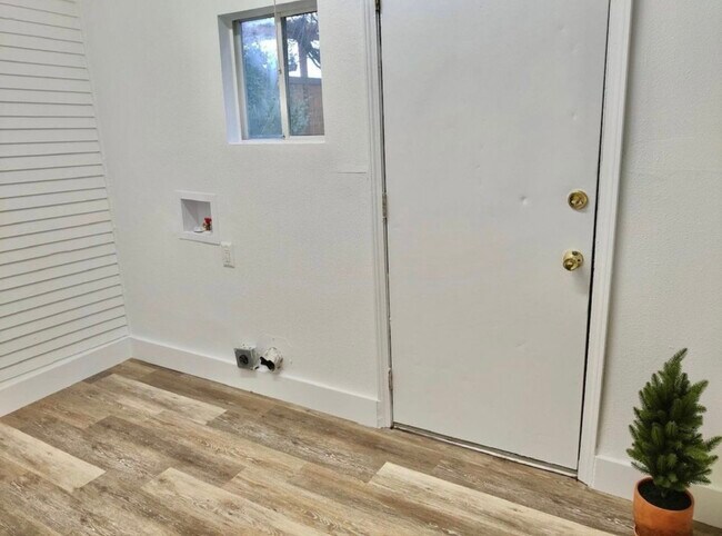 Mudroom and laundry area - 8117 N Olympia St