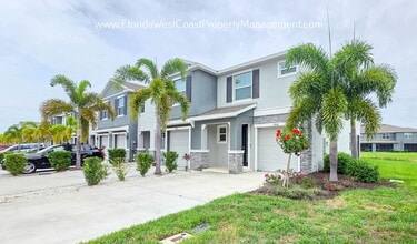 Building Photo - OUTSTANDING CORNER TOWNHOME  3 Bedroom/2.5 BATH PLUS FLEX- BONUS! SUPER LOCATION TO WATERSIDE- SA...