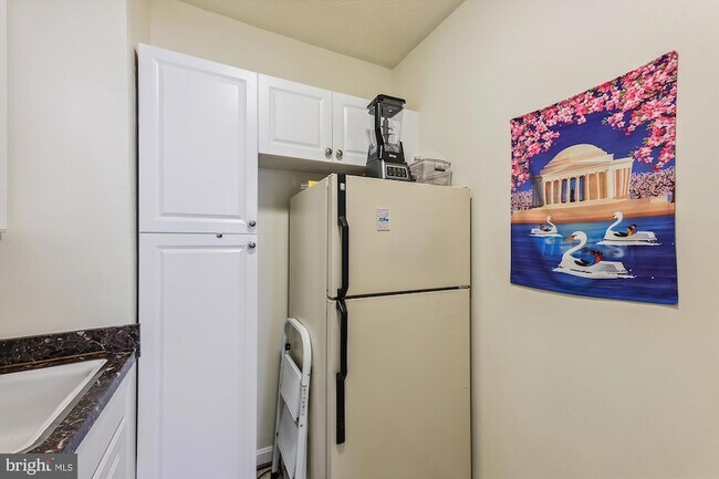 Building Photo - 4242 East-West Highway Unit 420