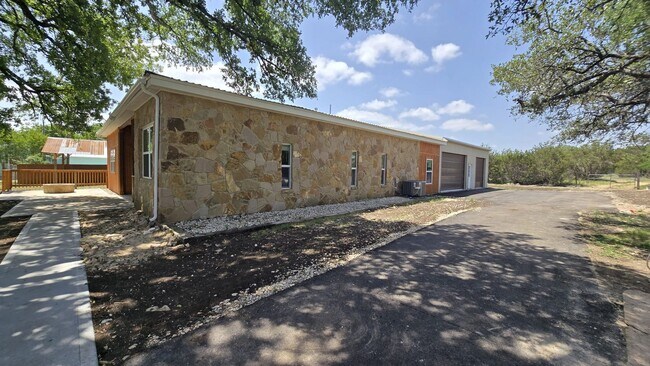 Building Photo - Spacious Ranch Style 5-Bedroom Home with Oversized 4 Car Garage / Workshop, 4 RV Carport & 1 Acre...