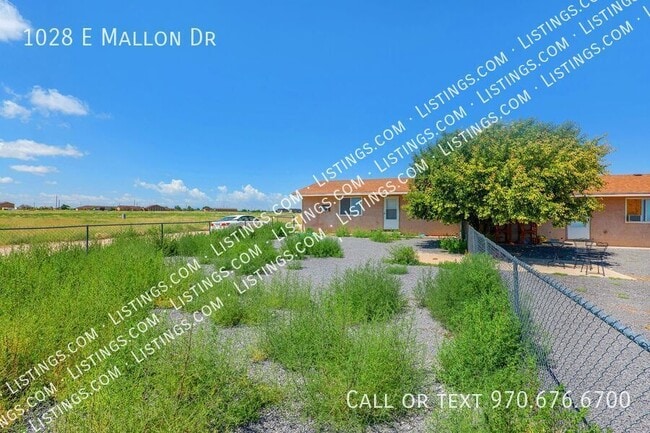 Building Photo - 1028 E Mallon Dr