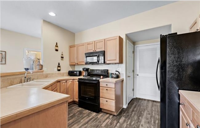 Building Photo - Spacious - 2-Bedroom + Office Condo at The Falls at Legend Trail