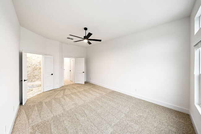 Building Photo - Brand-New, Never-Lived-In Townhome – A San...