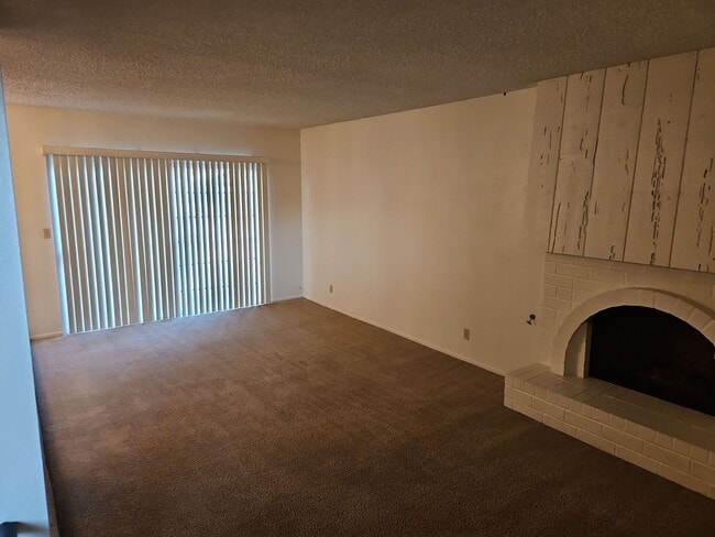 Building Photo - Spacious 4-Bedroom Home with Large Backyard & Covered Patio!