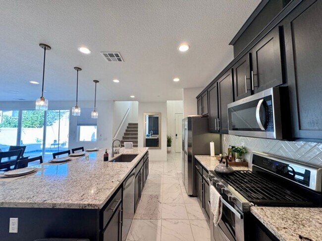 Building Photo - Elegant 4 Bedroom, 4.5 Bathroom Home with ...