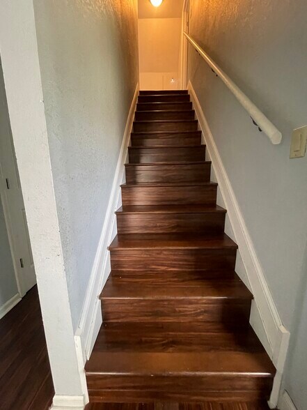 Stairs to upstairs - 282 N Franklin St