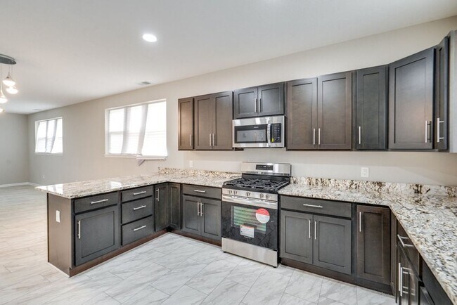 Building Photo - Brand-New 3-Bed, 2.5-Bath Condo: Modern Co...