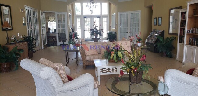 Building Photo - 4 BR / 3 FULL BATH (INCLUDES 2 MASTERS) 2 STORY (NEAR DISNEY!) GATED COMMUNITY WITH COMMUNITY POO...