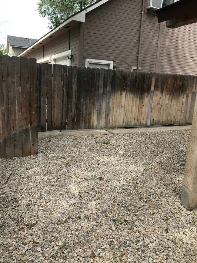 Building Photo - Updated 2 BR / 1.5 BA End Unit – Private Yard & Fresh Interior!