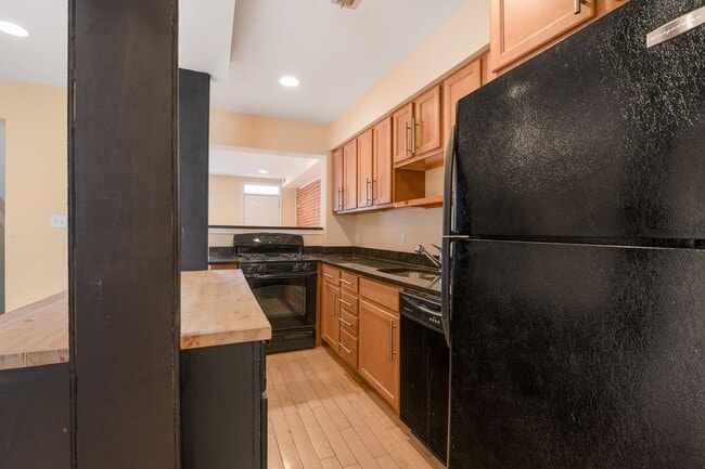 Building Photo - Spacious 2BR/2.5BA Townhome with Finished Basement & Extra Storage