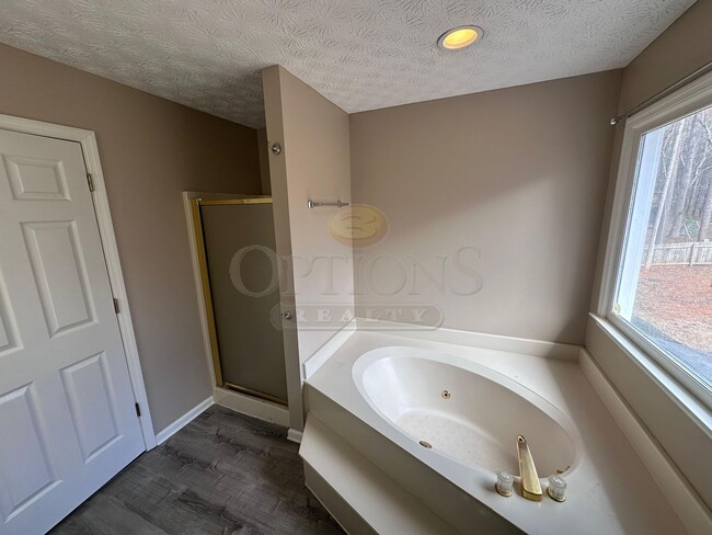 Building Photo - 4BR/3BA on Large Private Wooded Lot- Woodstock