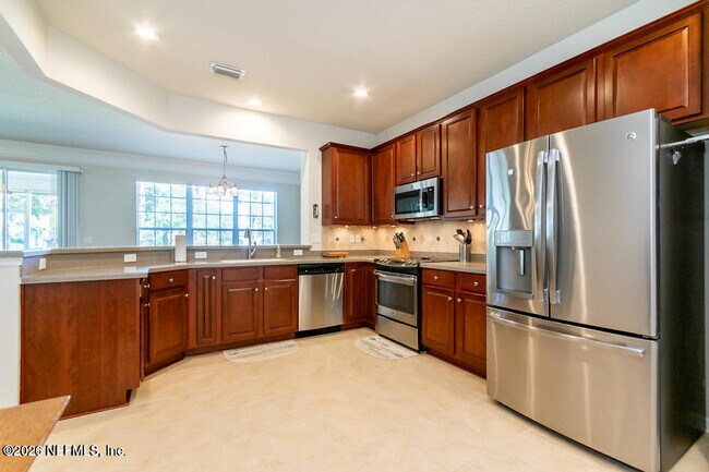 Building Photo - 6487 White Flower Ct