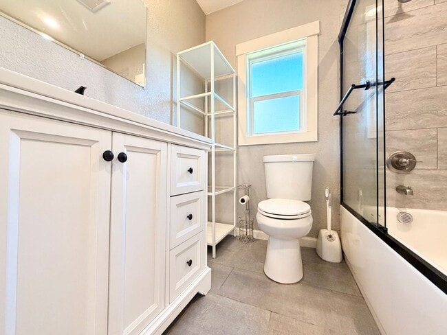 Building Photo - Lovingly Updated Home with Separate Garage, Outdoor Cat Enclosure, Finished Basement, Large Yard,...
