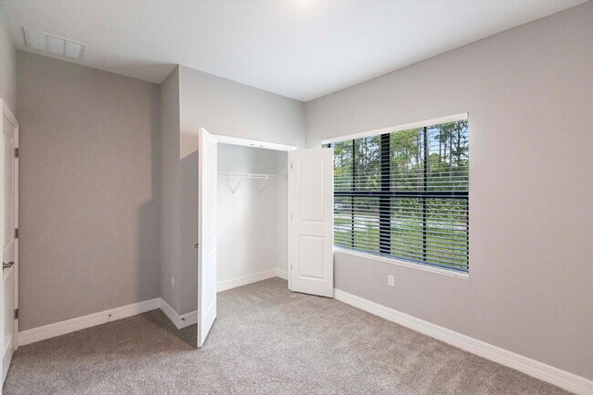 Building Photo - Brand New 4-Bedroom Gem with 2 Full Baths on Large Lot in Lehigh Acres – A Perfect Family Haven!