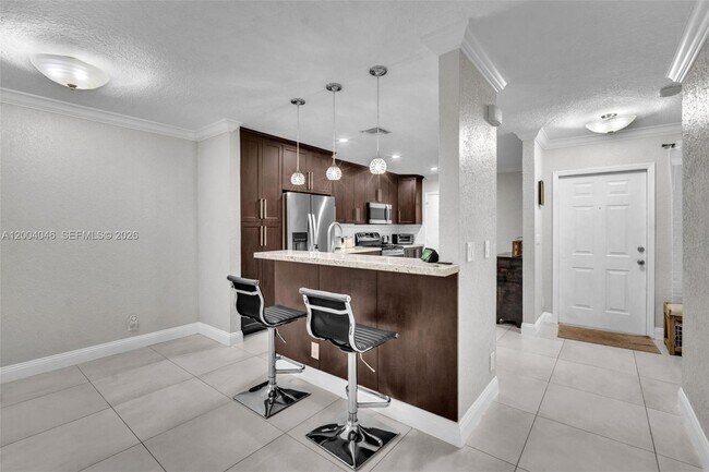 Building Photo - 10112 Royal Palm Blvd