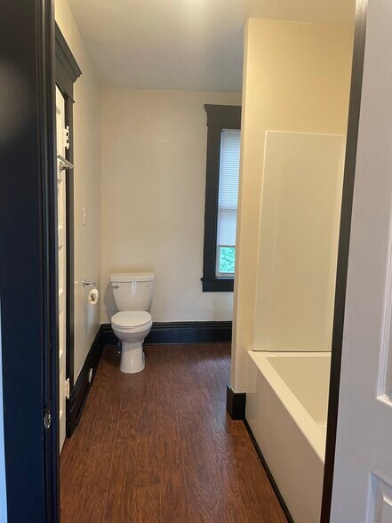 New bath with tub shower and vanity - 6319 Monitor St