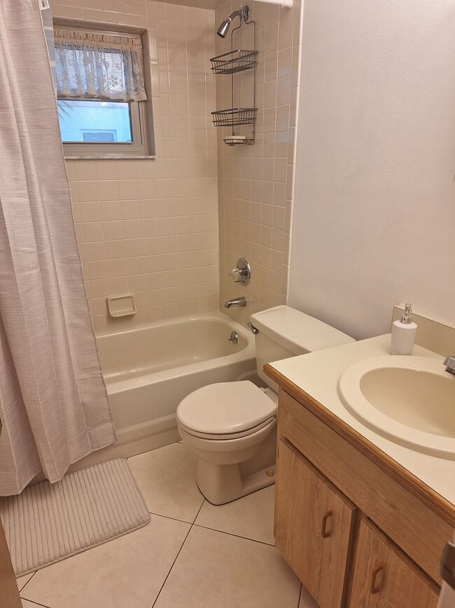 Building Photo - PELICAN COVE WEST 2BR 2BA WITH GARAGE FOR RENT