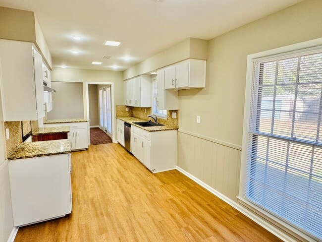 Building Photo - Updated 4-Bedroom Ranch with the layout everyone wants