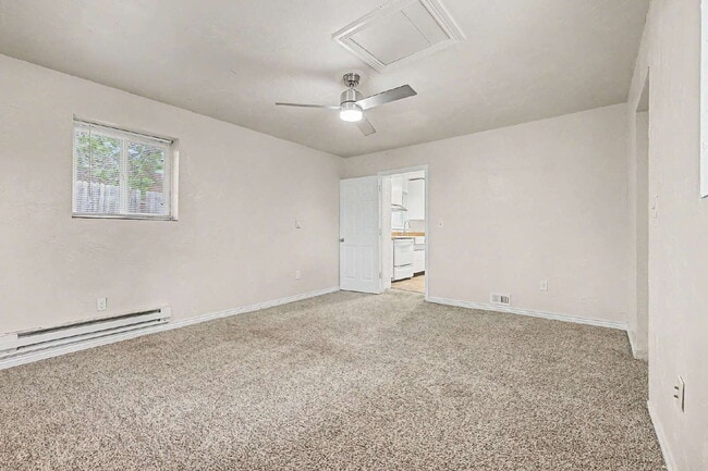 Building Photo - "Charming 3-Bedroom Duplex Retreat on Chester Street, Aurora – Cozy 1206 Sq Ft Home Awaiting Your...