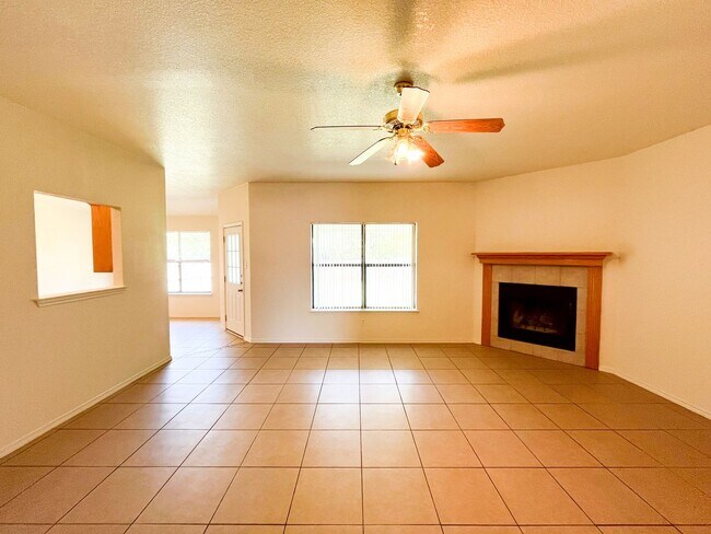 Building Photo - Available NOW!!!! Open floor plan features living room with fireplace, dining area, and large kit...