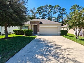 Building Photo - Charming & Modern 3-Bedroom Home with Brig...