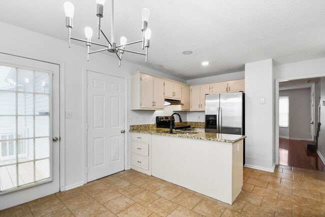 Building Photo - Pet Friendly Three Bedroom!