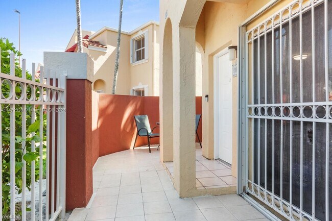 Building Photo - 2 br, 2.5 bath House - 8530 NW 3rd Ln # 411