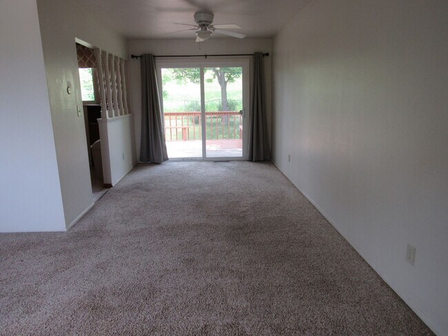 Building Photo - Spacious Bi Level home backing to open space