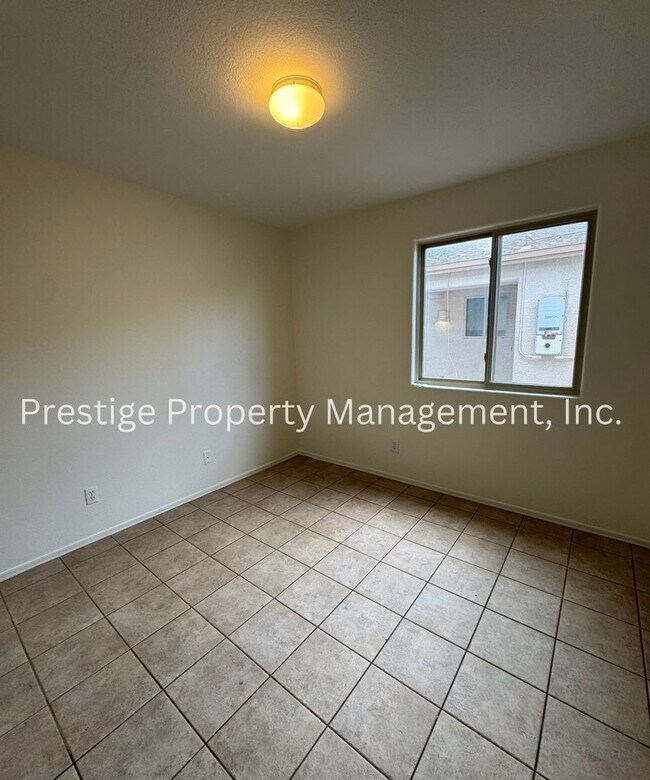 Building Photo - Charming All Tile 4/2 Rita Ranch Home