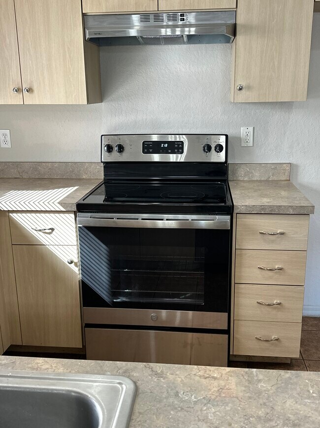 Flat top stainless steel stove - 208 W Tever St