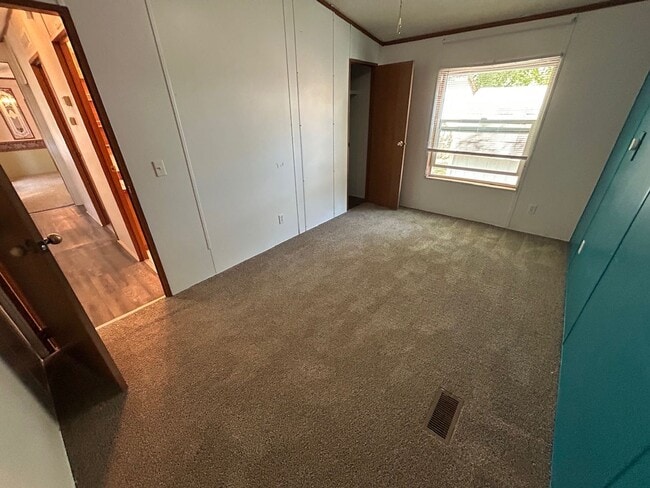 Building Photo - 3 Bed 2 Bath Mobile Home with Fenced Yard and Storage Shed